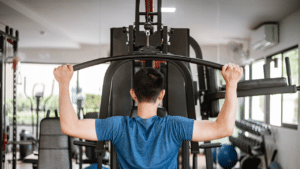 weight lifting teenager at bench